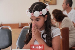 En oración.