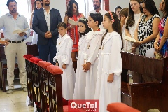  Listos para hacer su Primera Comunión.