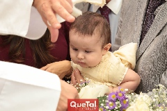  Gerardo en la pila bautismal.