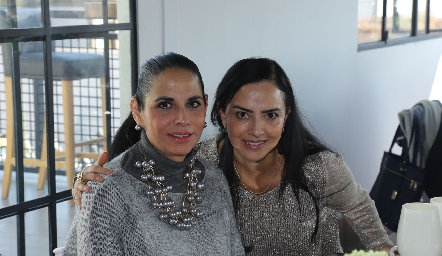  Maru de Morales y Carla Ruiz.