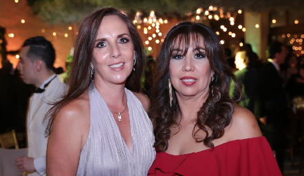  Claudia Pedroza y Edith Muñoz.