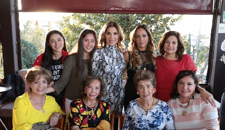  Susana con su familia.