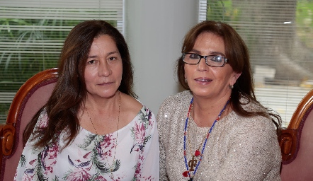  Yolanda Castillo y Flor Márquez.