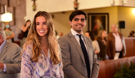  Ana Paula López y Santiago Rodríguez, padrinos de Xaviera y Carlota.