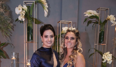  Meli Velázquez y Andrea González.