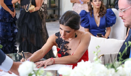  Firmando como testigo.