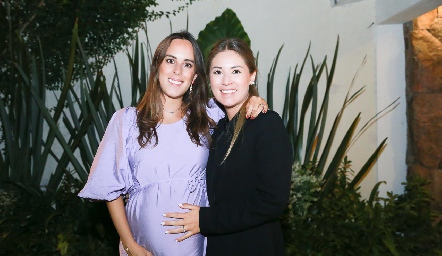  Clau Antunes y Ale Puente.