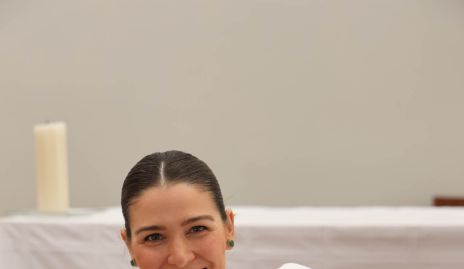  Joselyn Cano con su ahijado Nicolás Gómez.